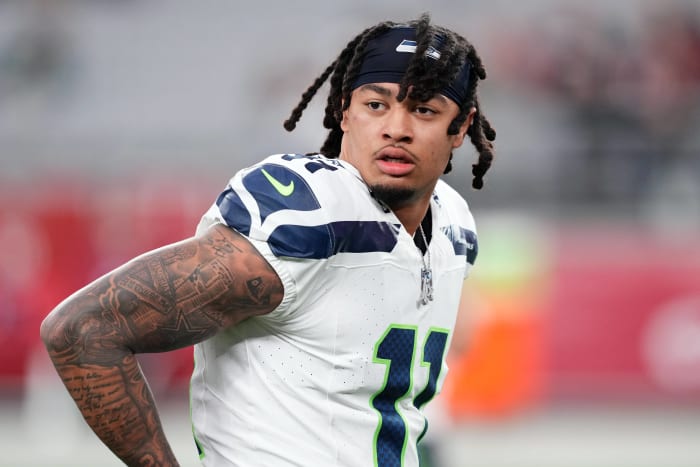 Seattle Seahawks wide receiver Jaxon Smith-Njigba (11) warms up prior to facing the Arizona Cardinals at State Farm Stadium.